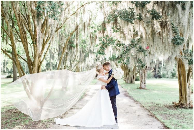 Breathtaking bridal shot on the grounds of The Cedar Room in Charleston, SC | Photo by Bow Tie Collaborative
